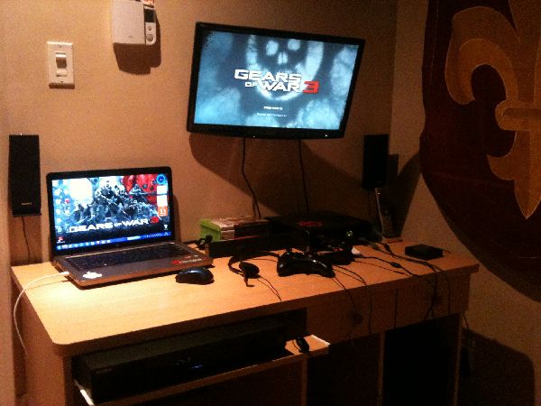 Xbox 360S, PC, !000 watt dolby surronf 5.1 sound systemand a 23inch LCD screen on a wall fix :D 